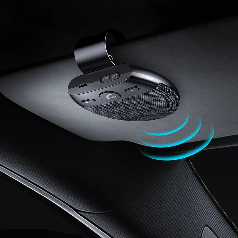 Bluetooth car handsfree device clipped to a car sun visor with black finish