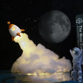 DIY LED Astronaut Rocket night light kit with string lights and assembly components on a desktop