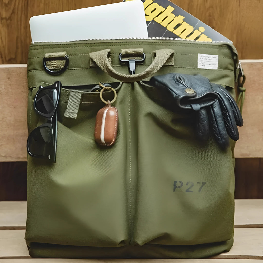 Marden Tooling medium-sized charcoal black canvas crossbody messenger bag with shoulder strap.