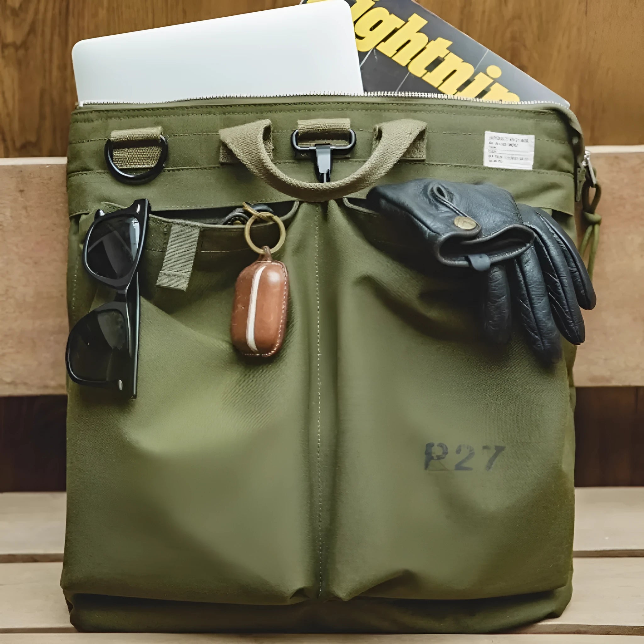 Marden Tooling medium-sized charcoal black canvas crossbody messenger bag with shoulder strap.