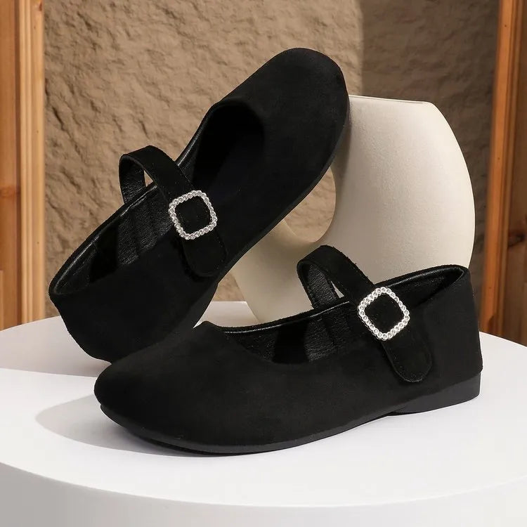 Black canvas fisherman shoes with rubber sole and low-top design