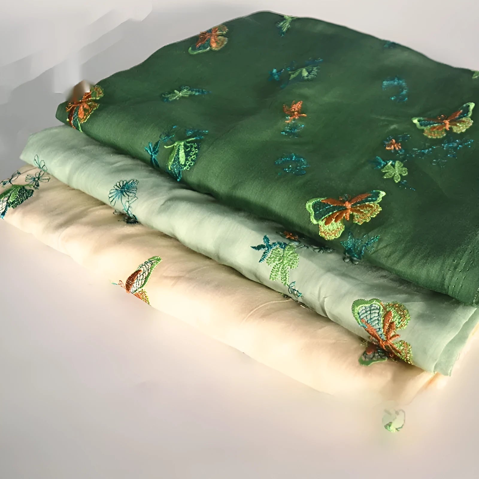 Pure ramie Hanfu fabric in three colours showing texture and 140cm width