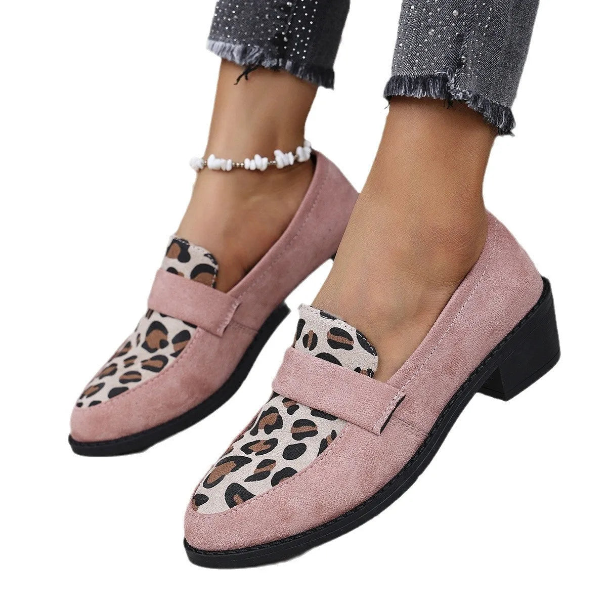 Leopard print suede slip-on pumps with a chunky heel and pointed toe in pink, brown, and khaki.
