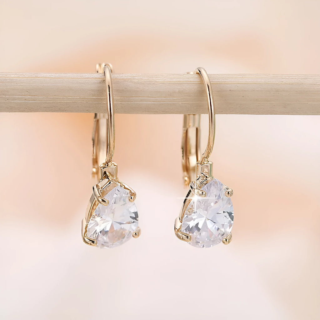 Copper drop-shaped earrings with platinum inlaid gemstone in gold and platinum colour options