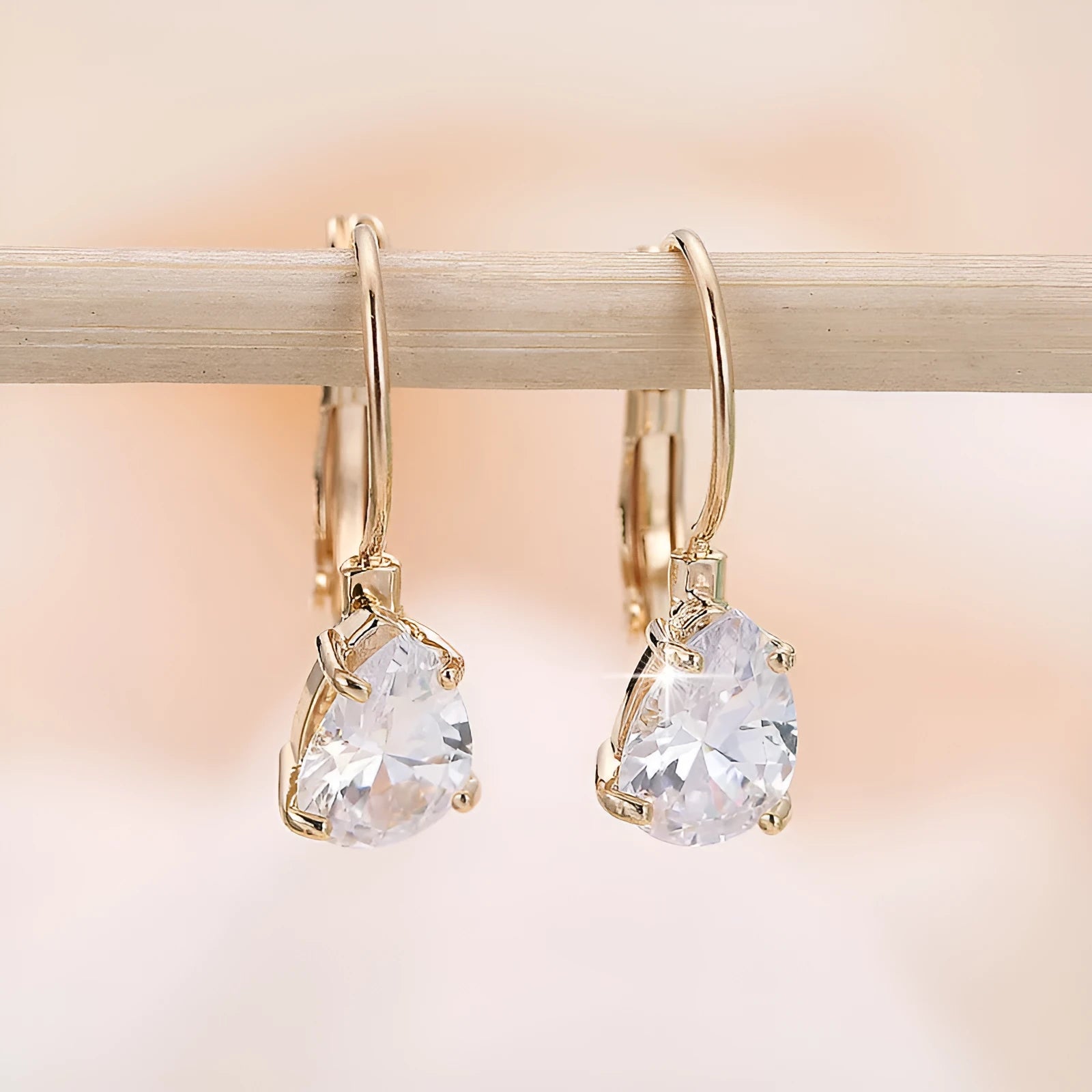 Copper drop-shaped earrings with platinum inlaid gemstone in gold and platinum colour options