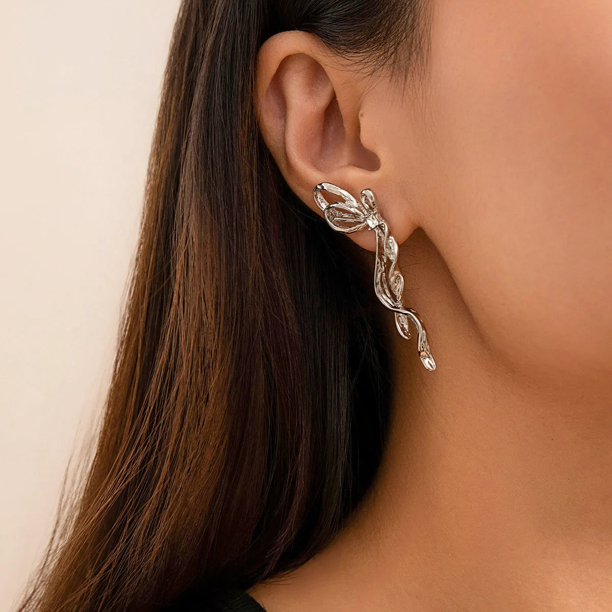 Bowknot earrings for women, alloy with electroplated White K finish, stud style, approximately 2.5cm width