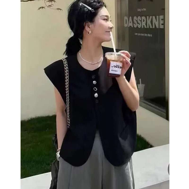 Women's loose fit polyester vest in milky white, showing front view with pockets.