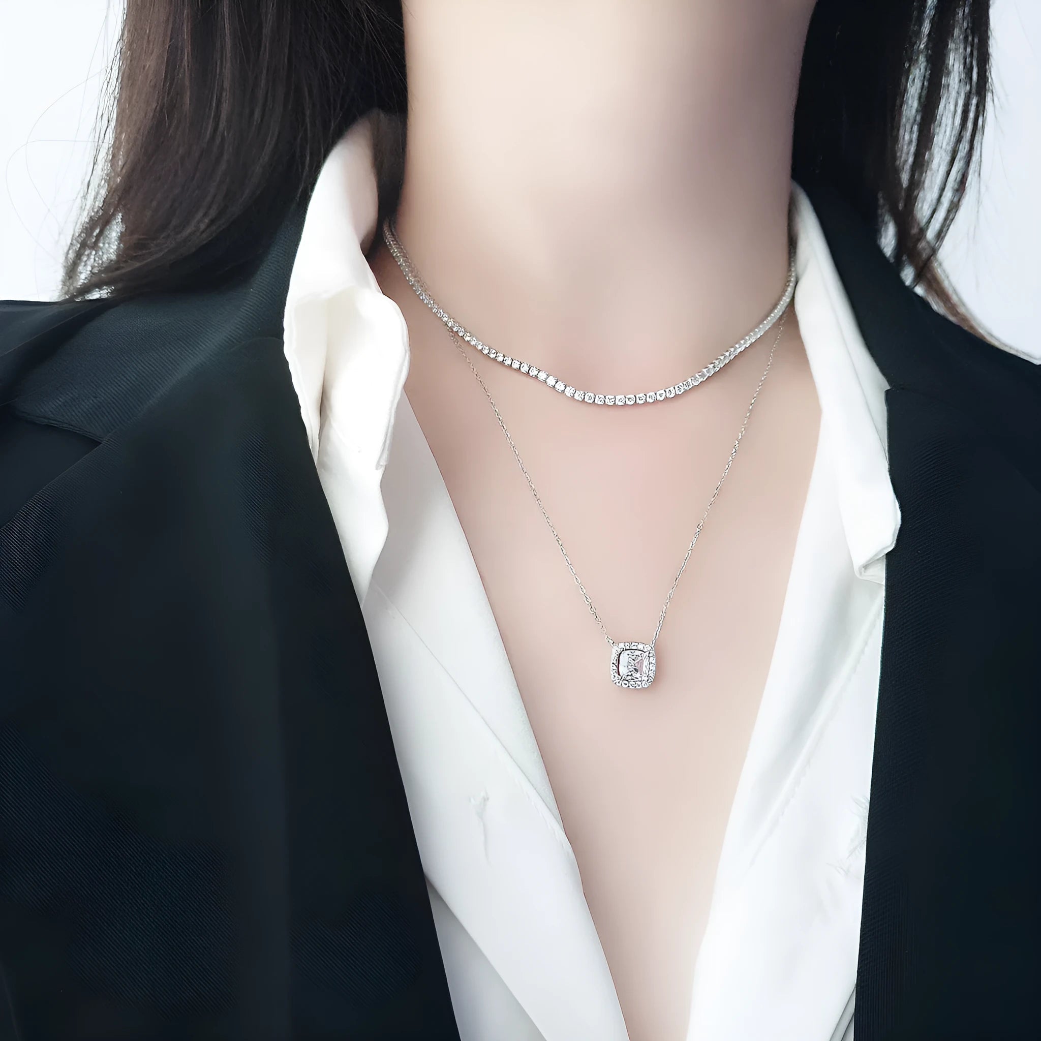 Women's sterling silver necklace with diamond-cut round pendant on fine chain