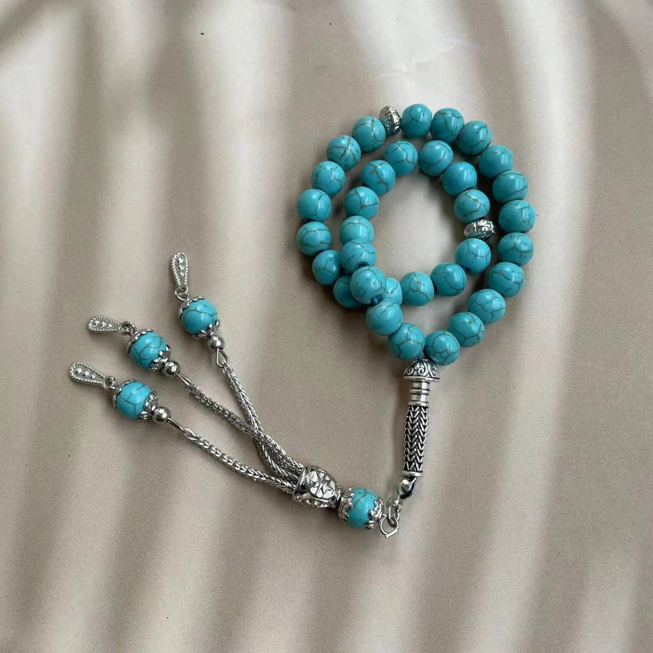 Sky blue Muslim prayer bracelet with 8mm stone beads on adjustable cord
