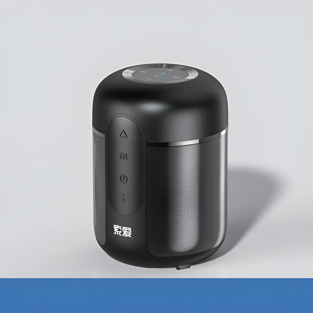 Black portable wireless Bluetooth speaker showing front grille and compact size.