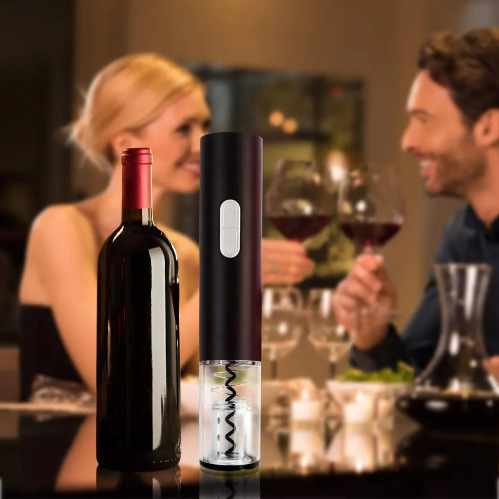 Black electric wine bottle opener with automatic corkscrew and foil cutter on a kitchen counter