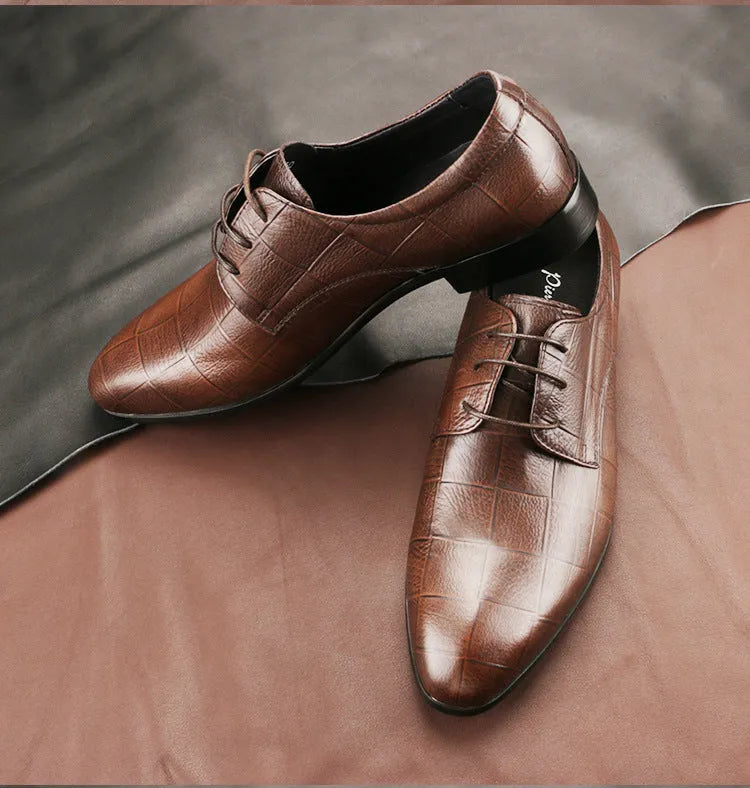 Men's black leather derby shoes with checkered detailing and pointed toe