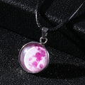 Luminous alloy pendant necklace with constellation design in coloured glass, showing extension chain