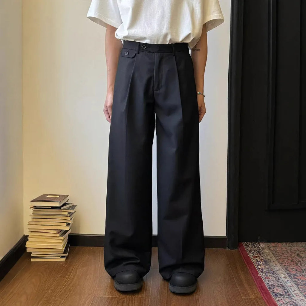 Men's brown straight-leg wide-leg casual trousers showing drape and fit