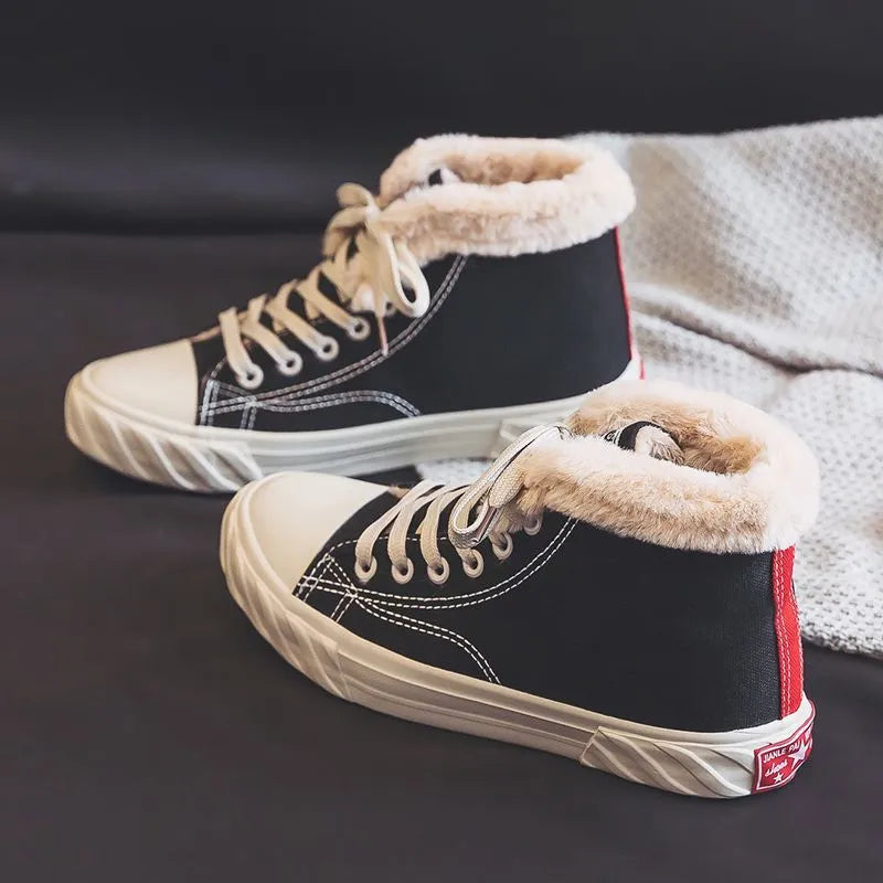 Women's black canvas high top trainers with animal print, cotton lining, buckle fastening and flat rubber sole, sizes 35-40