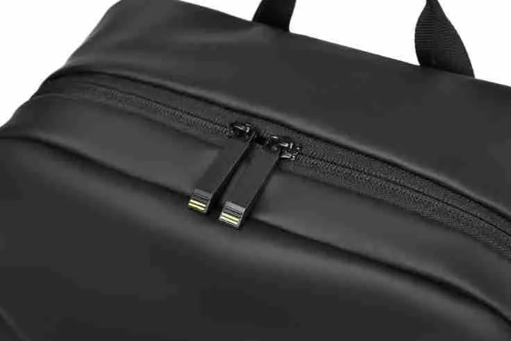 Men's waterproof PU leather backpack in black colour with computer compartment and sewing thread details