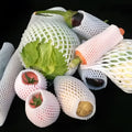 White foam shockproof protective case for colourful fruit showing size options