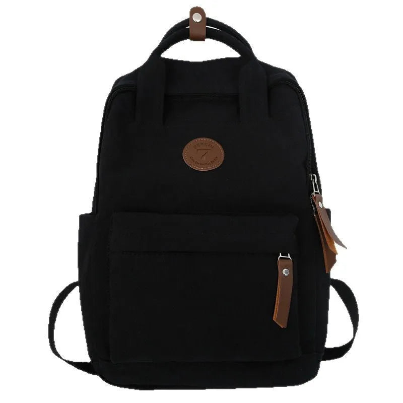 Black retro style Oxford cloth unisex backpack with curved shoulder straps.