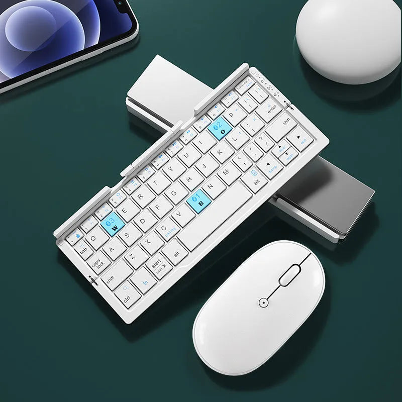 Silver white folding Bluetooth keyboard with integrated phone stand, shown open for typing and folded for storage