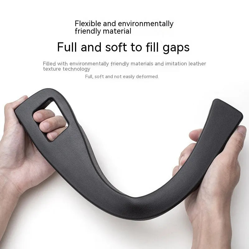 Black plastic car seat gap storage box organiser with handle between vehicle seats