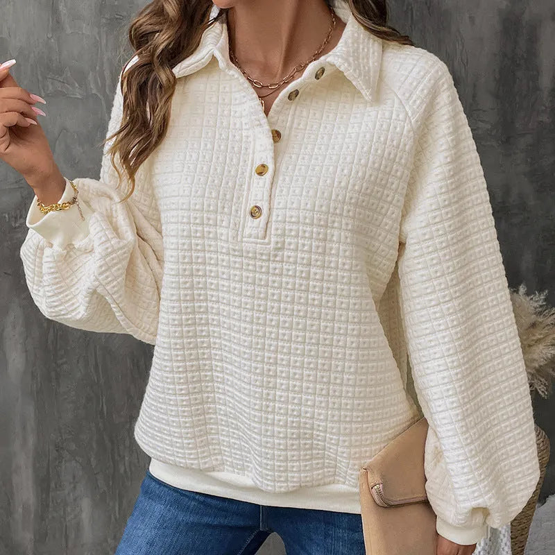 Beige women's textured knit sweater with a polo collar and long sleeves.