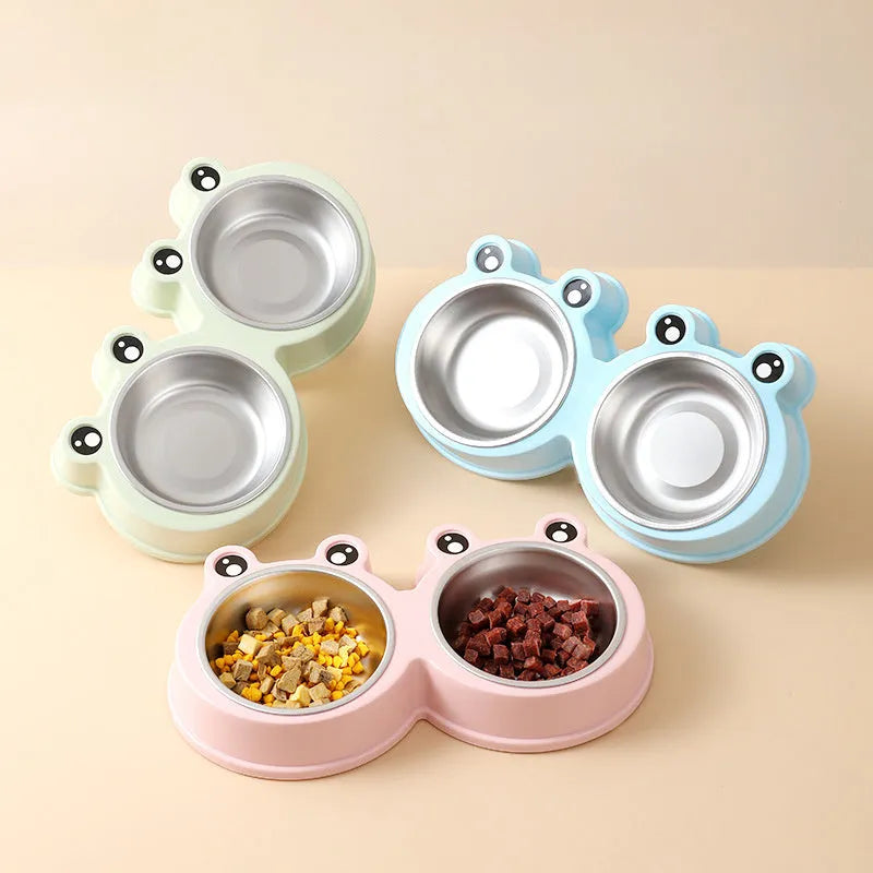 Blue stainless steel double pet bowl with frog design for cat and dog food and water.