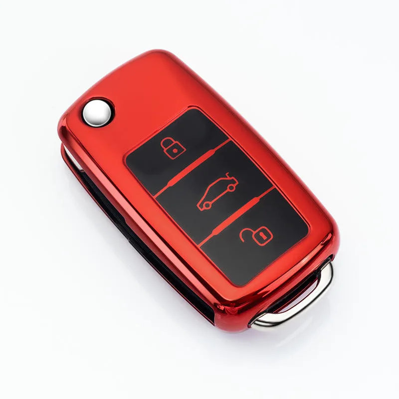 VW Model A car key case in four colours: blue, pink, red, and silver with buckle attachment
