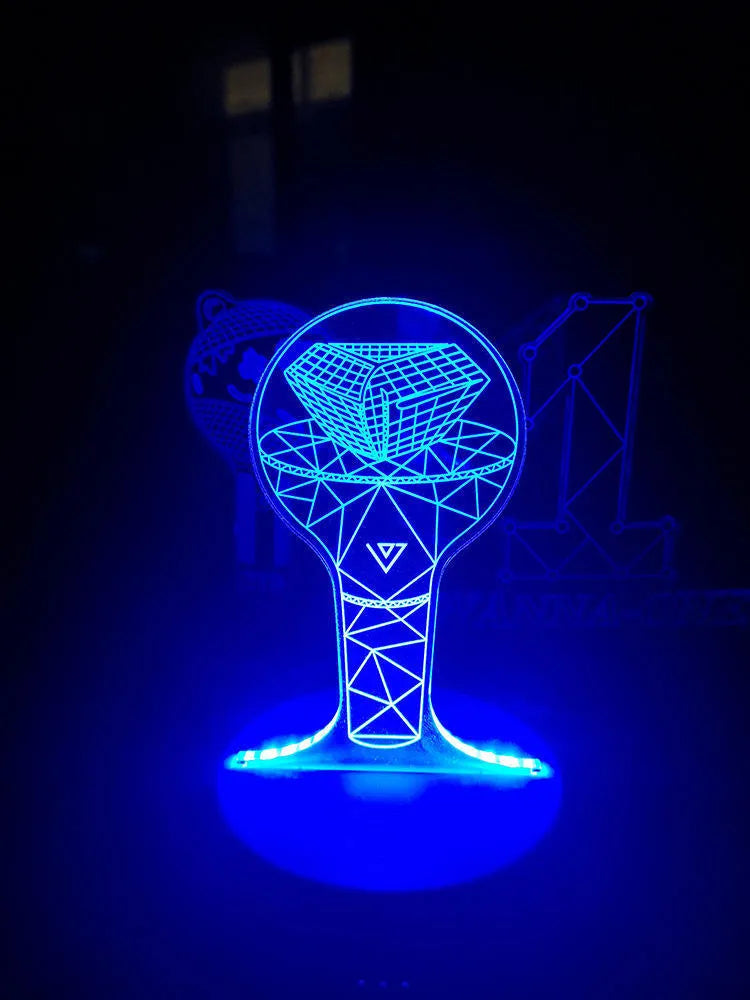 Clear acrylic display stand supporting 101 Tower Gem BTS lamp with universal voltage compatibility