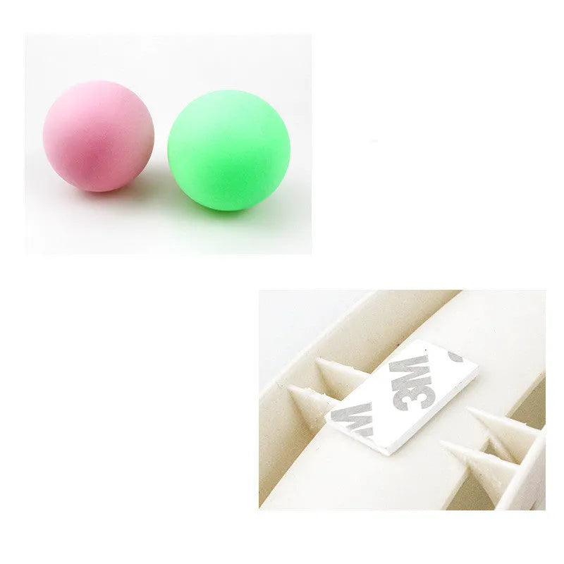 White plastic curved cat track toy, 34cm, fixed to a smooth surface with two small balls in the channel