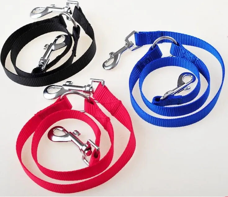 Double dog lead coupler in nylon, available in black, blue, purple, and red, sizes small medium large, 45cm length