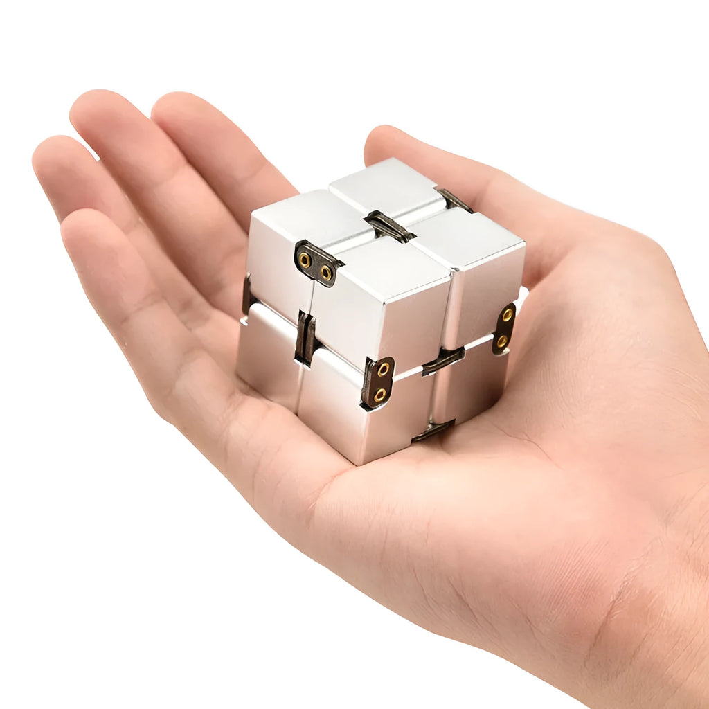 Zinc alloy infinity cube fidget toy showing rotating black cubes in 4cm metal construction