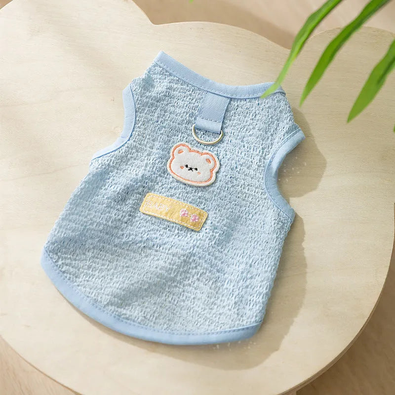 Bear patch cat clothing in hollowed-out knitted fabric shown in blue, green and yellow colours