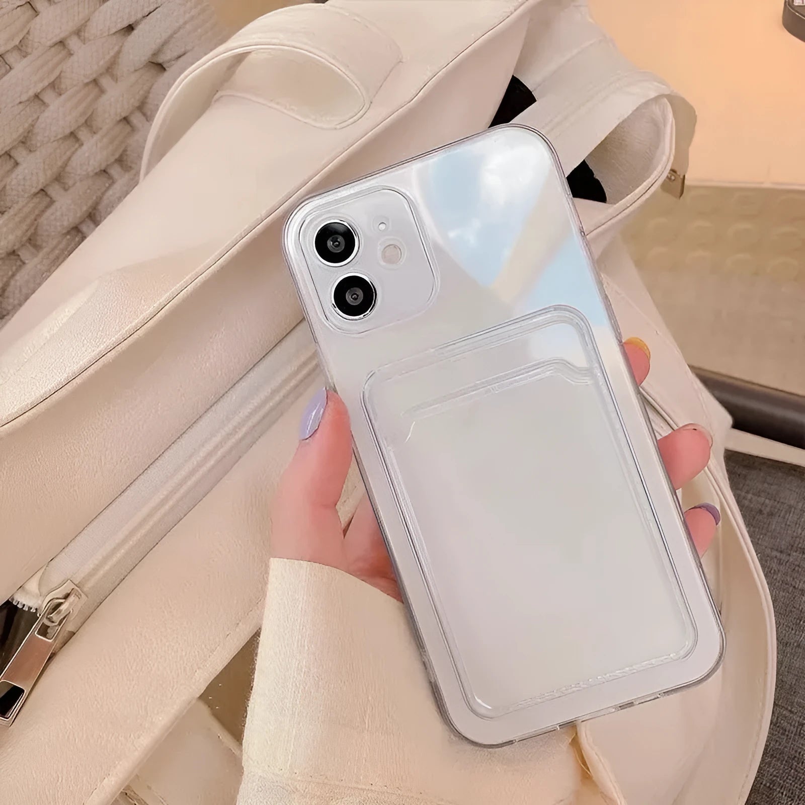 Clear transparent PVC phone case for iPhone with card slots on the back.