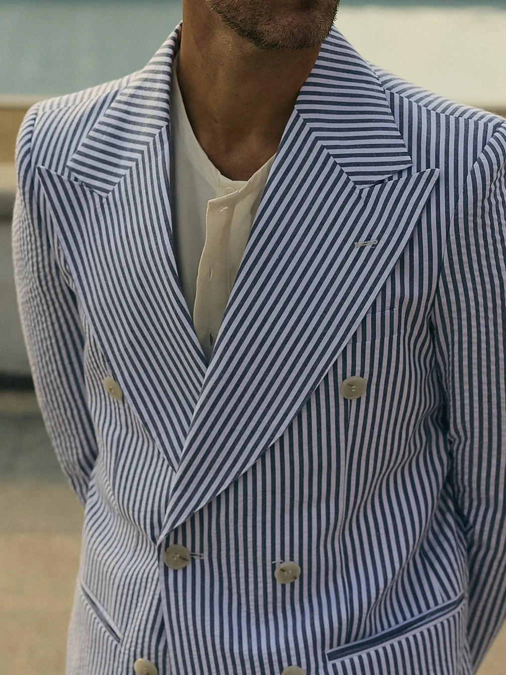 Blue and white striped polyester suit set with blazer and regular fit trousers