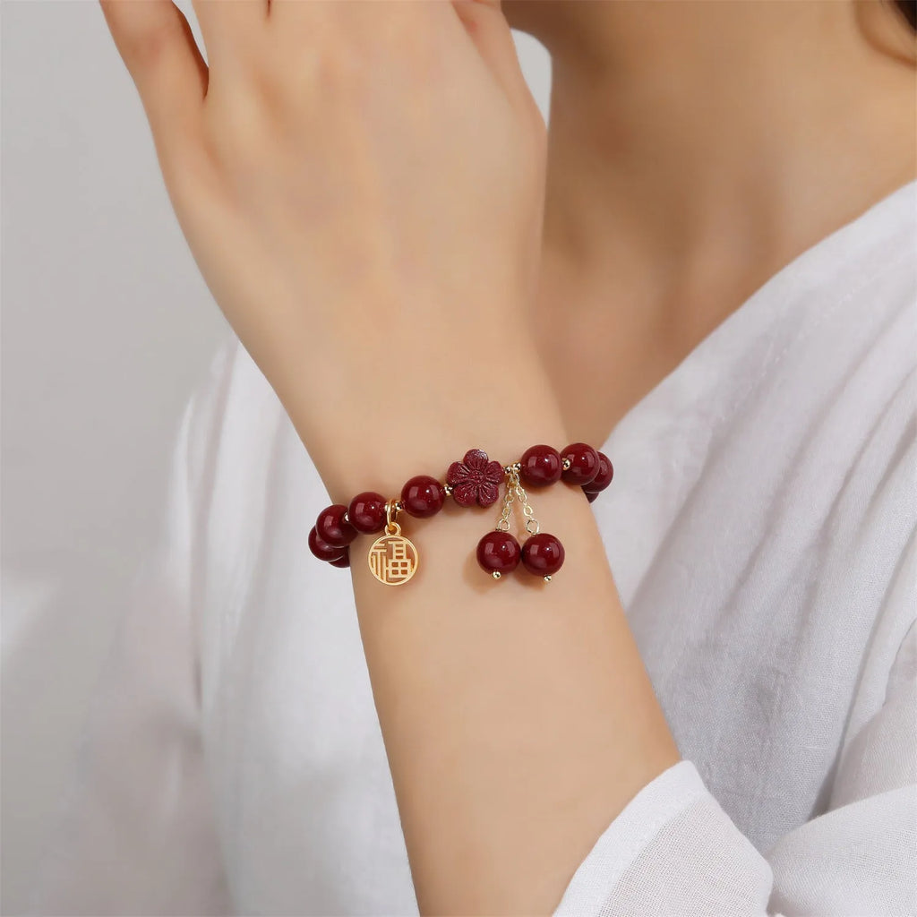 Women's cinnabar bracelet with fu character design and adjustable tassel closure in national style
