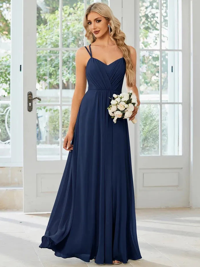 Women's long pleated A-line dress with sleeveless sling neckline in solid colours
