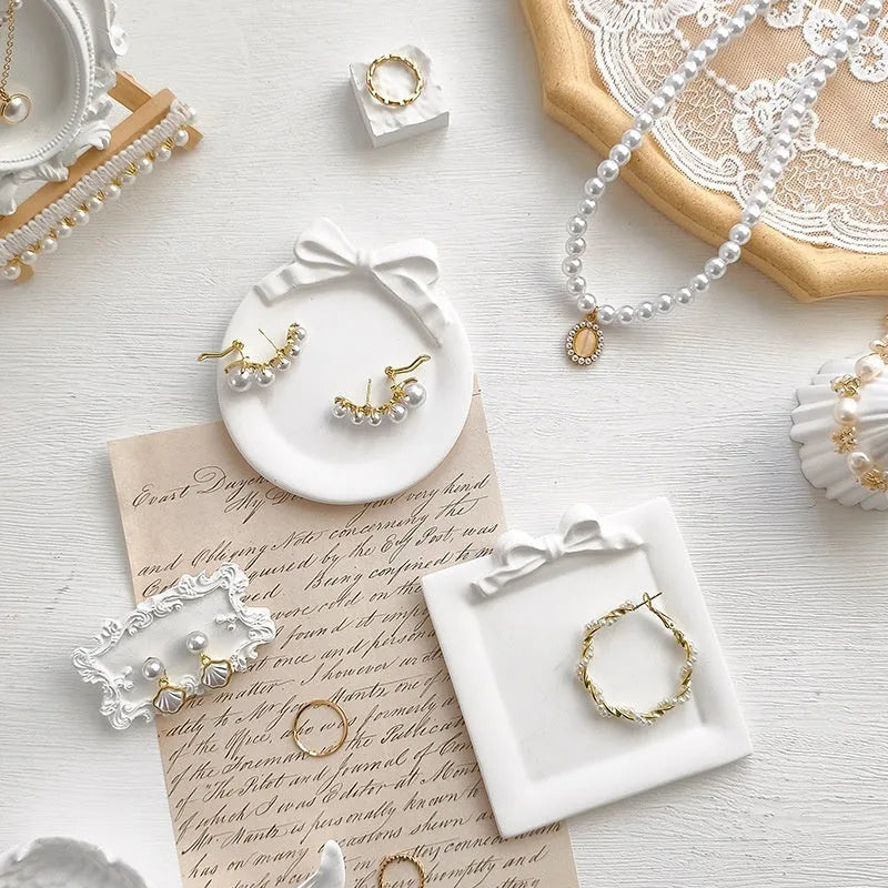 White Baroque gypsum jewellery display plate with decorative edges, available in multiple sizes