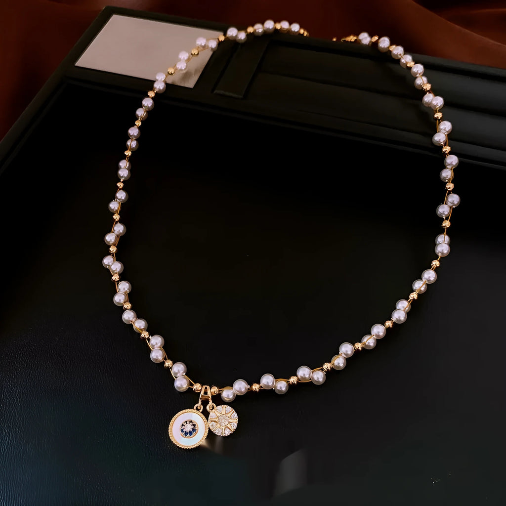 Gold electroplated women's necklace with round pearl pendant and adjustable clavicle chain