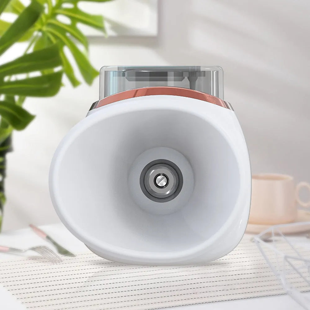 White and purple portable eye humidifier with USB charging cable on white background