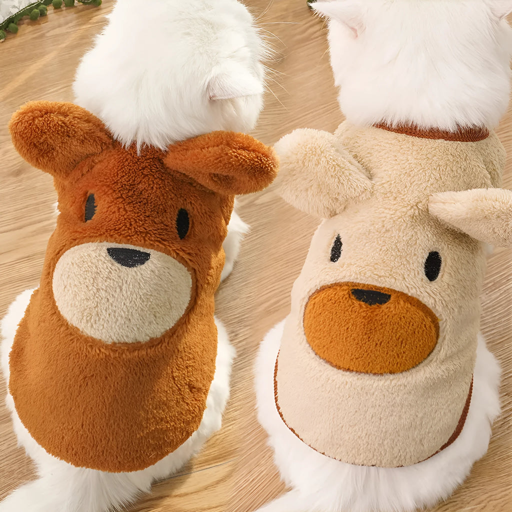 Fleece-lined warm dog clothes in cream with brown bear ears on a small dog