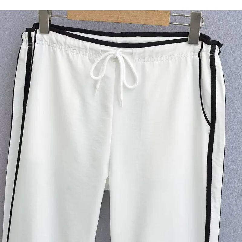Women's loose straight-leg trousers with contrast ribbon parallel bars detail in navy blue