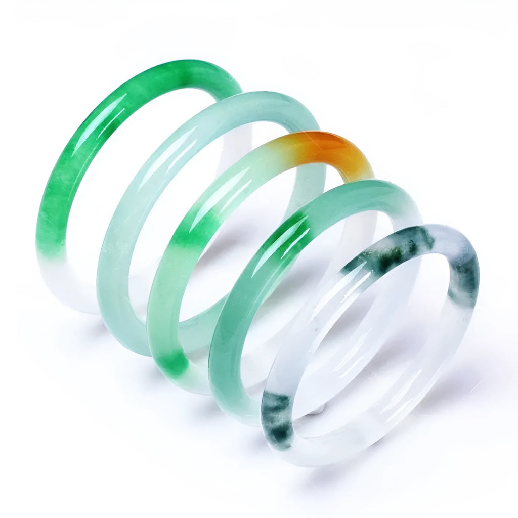 Jade bracelet with floating flower design and auspicious cloud patterns in green colour