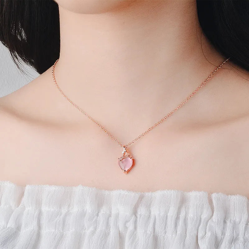 Women's pink heart crystal necklace with rose gold cross chain pendant