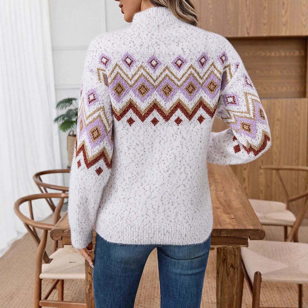 White half turtleneck loose sweater with jacquard geometric pattern and long sleeves.