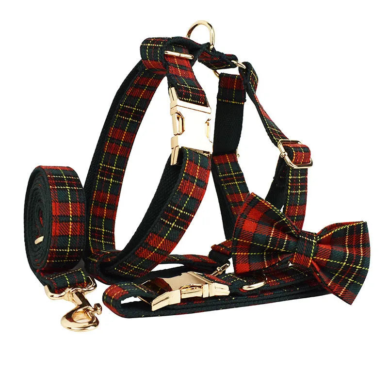 Christmas plaid green dog collar set with leash bow and vest on a festive background