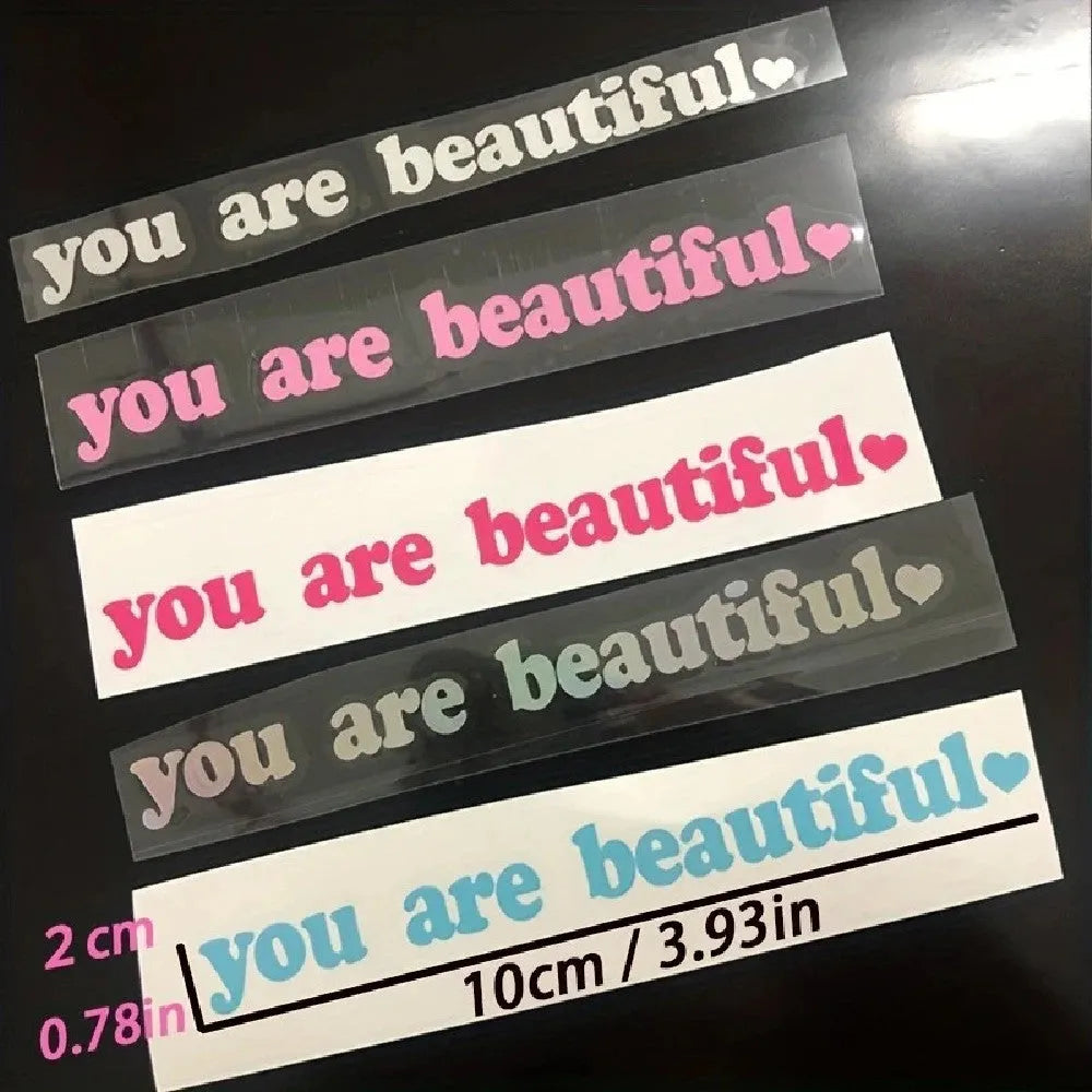 Waterproof PVC vinyl sticker showing colour options including metallic finishes, measuring 10cm wide by 1.5cm high.