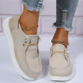 Women's flat shoes in beige with breathable cloth upper, elastic band, round toe, and low heel