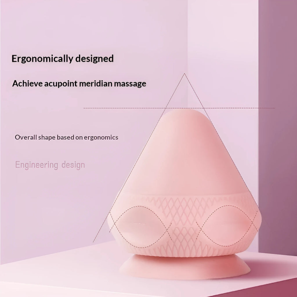 Silicone massage ball 32x75mm in pink for fitness and muscle relief on a white background