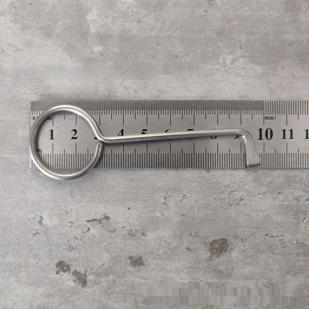 Two alloy steel wrench tools from a portable set for universal household and automotive use.