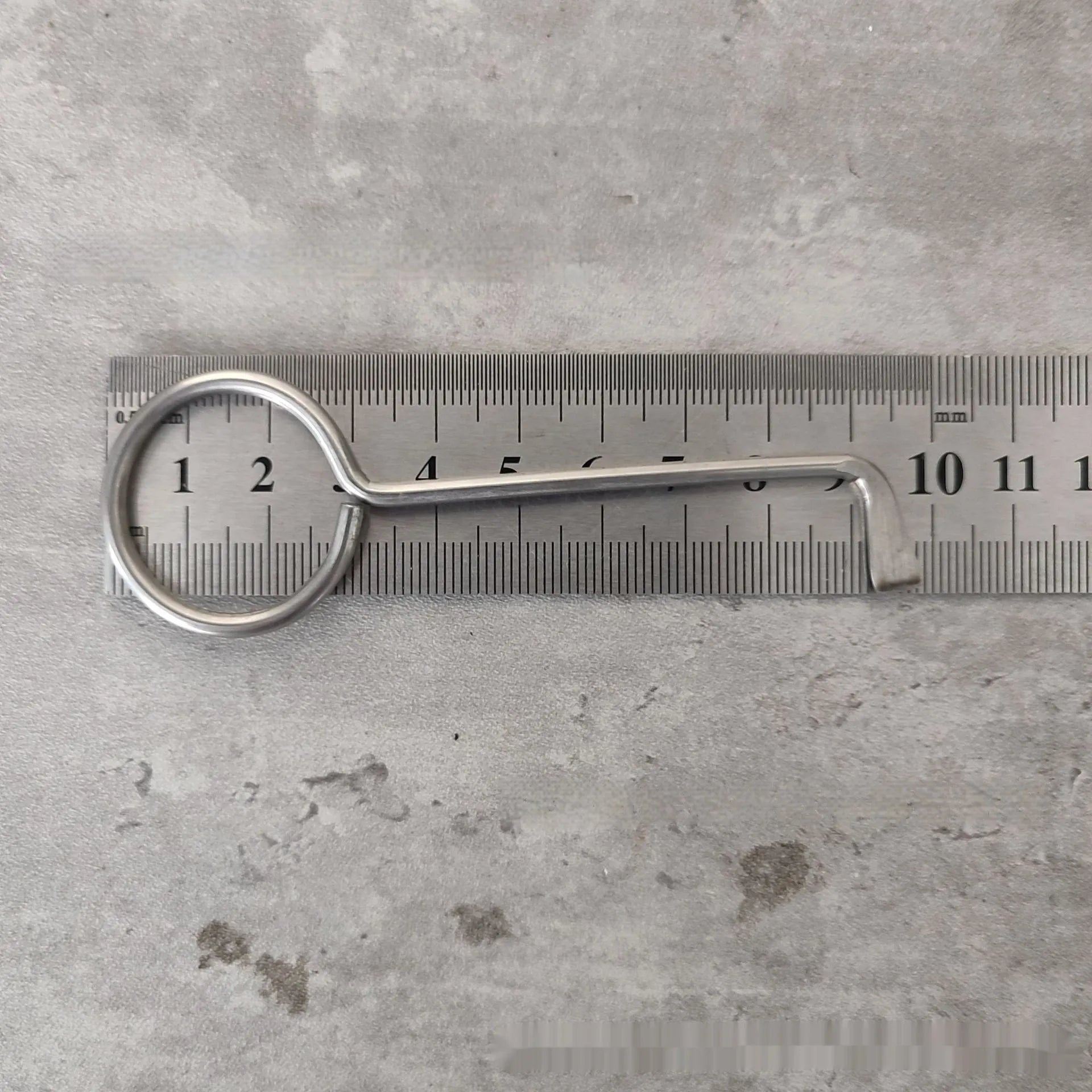 Two alloy steel wrench tools from a portable set for universal household and automotive use.